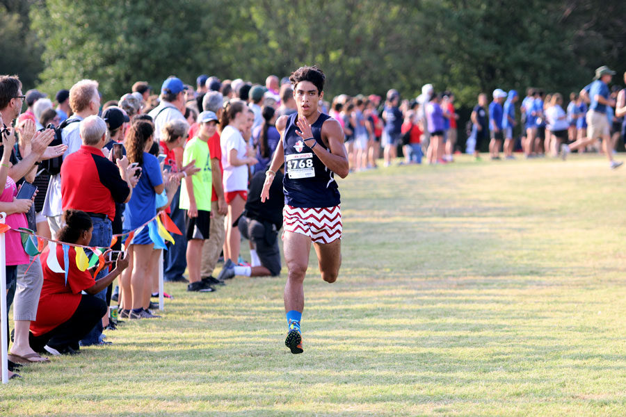 Junior David Aussenhofer during his run at the Guyer Wildcat Prowl.